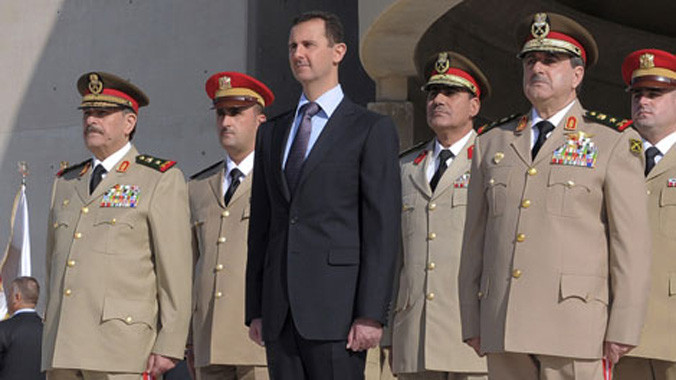 Tổng thống Bashar al-Assad cùng các tướng lĩnh tại buổi lễ kỷ niệm lần thứ 38 cuộc chiến tranh Arập - Israel tháng 10/1973.