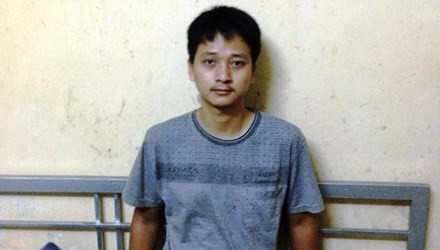 Phạm Duy Quý tại cơ quan công an ngày 2/8.