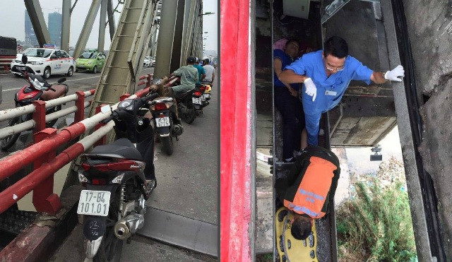 Lực lượng chức năng cứu hộ nạn nhân.