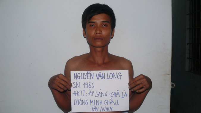 Nguyễn Văn Long tại cơ quan điều tra. Ảnh CA cung cấp. 