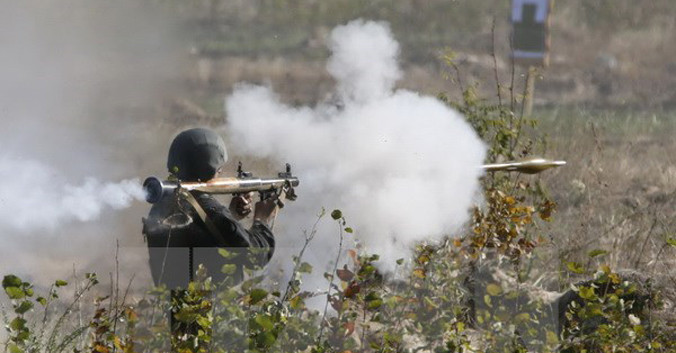 Binh sỹ Ukraine trong buổi diễn tập quân sự tại vùng Kiev. Nguồn: Reuters/TTXVN.