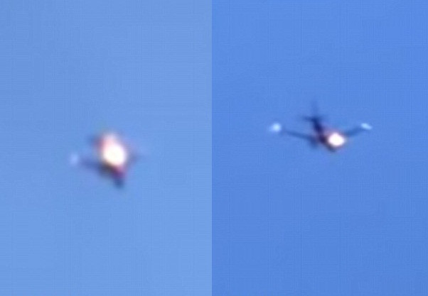 Máy bay bốc cháy giữa trời.