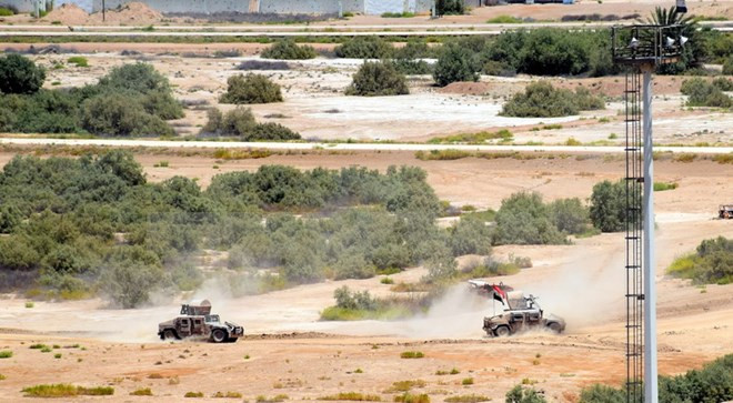 Binh sỹ Iraq trong chiến dịch truy quét các tay súng IS tại thành phố Fallujah. (Nguồn: EPA/TTXVN)