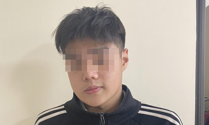 Hoàng Quốc Anh tại cơ quan công an. Ảnh Công an TP Hà Nội.