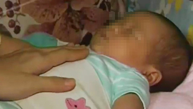 Bé T. đã được giải cứu an toàn và về trong vòng tay mẹ.