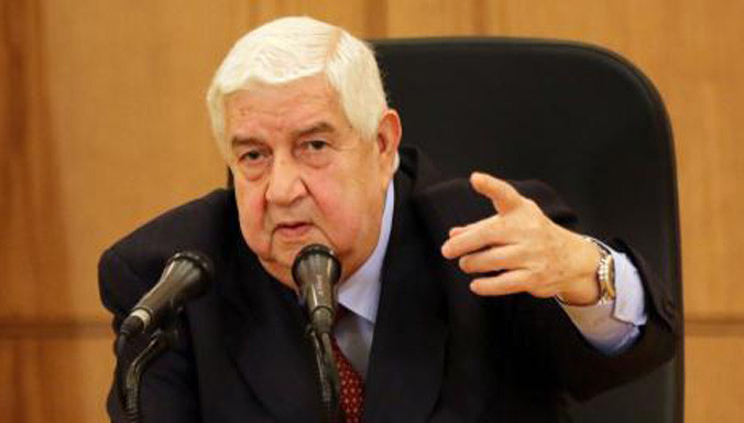 Ngoại trưởng Syria Walid Muallem phát biểu họp báo ở thủ đô Damascus hôm 12/3. Ảnh: AFP/TTXVN.