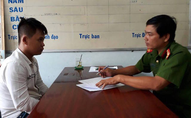 Bị can Hồ Huỳnh Tuấn Anh tại cơ quan điều tra vào ngày 18/10