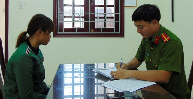 Đối tượng Dung tại cơ quan điều tra. Ảnh: Công an Nhân dân