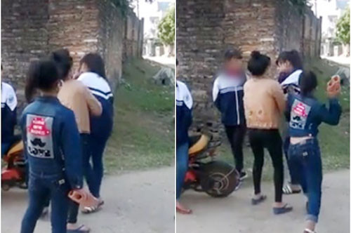 Nhóm nữ sinh cầm gạch hành hung bạn giữa ban ngày. Ảnh cắt từ video