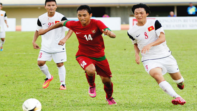 Tuấn Anh và các đồng đội sẽ có dịp tái đấu cùng các cầu thủ Olympic Indonesia. Ảnh: Anh Khoa.