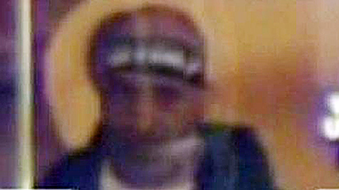 Hình ảnh đầu tiên về nghi phạm bắt cóc con tin ở Sydney. Ảnh 9News.