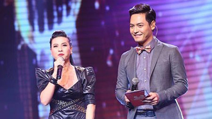 MC Cát Phượng (trái) và Phan Anh tại chương trình “Cặp đôi hoàn hảo”.