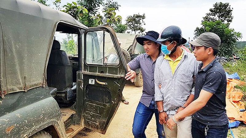 Vũ bị dẫn giải đến hiện trường