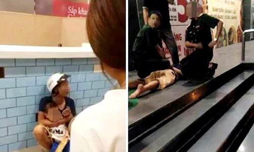 Người đàn ông ghì cổ bé trai và sau hai tiếng đã bị khống chế. Ảnh: Hồng Anh