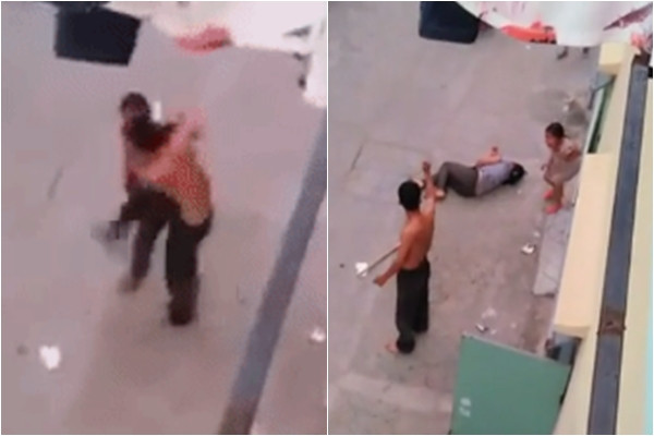 Đứa bé hoảng loạn chứng kiến cảnh bố cứa cổ mẹ. Ảnh cắt từ clip