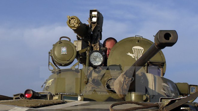 Binh sỹ Ukraine tuần tra gần thị trấn Debaltseve ở Donetsk. Nguồn: AFP/TTXVN.