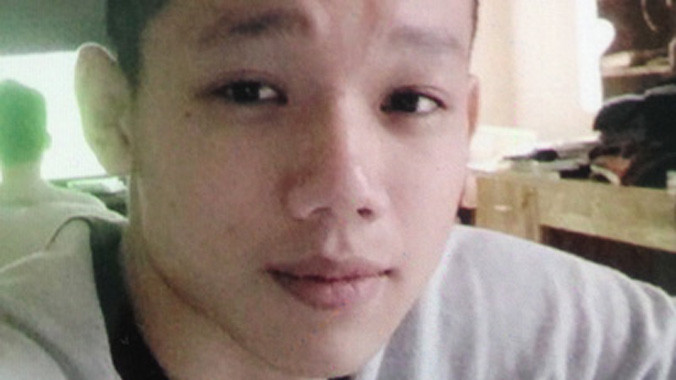 Nghi can Minh tại cơ quan điều tra. Ảnh CA cung cấp. 