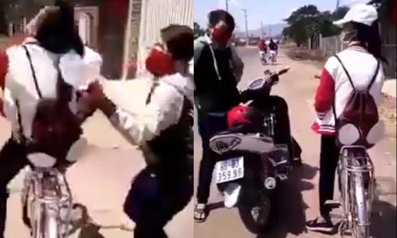 Nữ sinh (đội mũ) bị đánh dã man