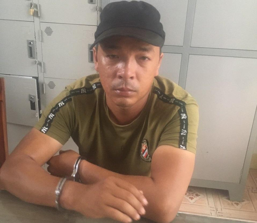 Phạm Viết Hùng tại cơ quan công an