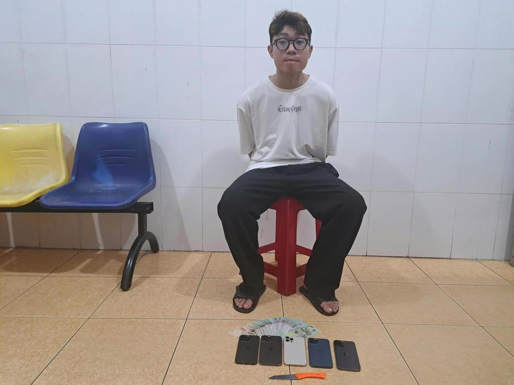 Nguyễn Thế Đăng Quang cùng tang vật