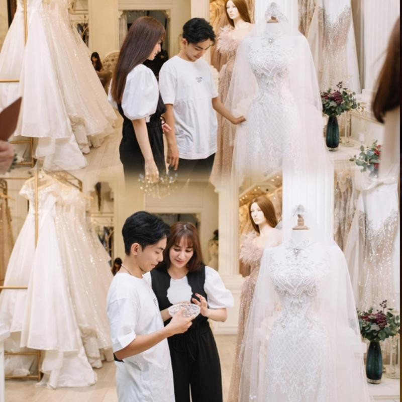 Cặp đôi cùng đưa nhau đi thử váy cưới. Cặp đôi cùng đưa nhau đi thử váy cưới.
