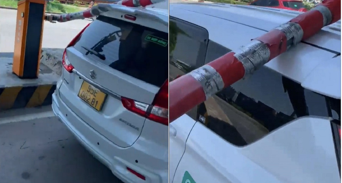 Hình ảnh xe taxi công nghệ đụng thanh chắn ở trạm thu phí Xa lộ Hà Nội. Ảnh cắt từ clip