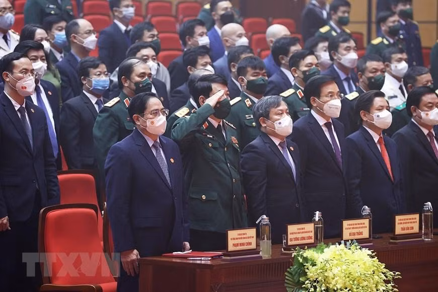 Hình ảnh Thủ tướng Phạm Minh Chính và các đại biểu thực hiện nghi lễ chào cờ. (Ảnh: Dương Giang/TTXVN) Hình ảnh Thủ tướng Phạm Minh Chính và các đại biểu thực hiện nghi lễ chào cờ. (Ảnh: Dương Giang/TTXVN)