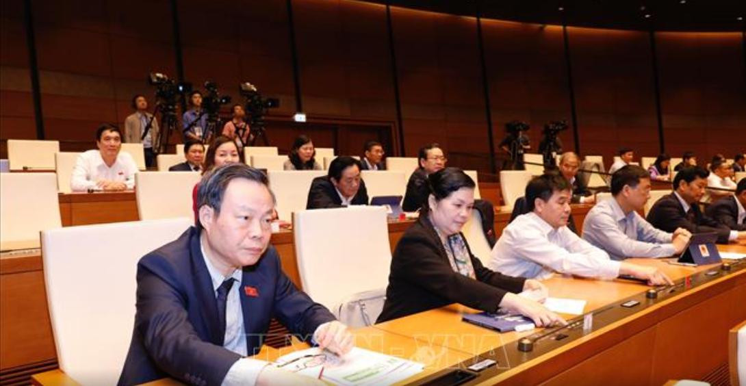 Kết quả biểu quyết có: 429/449 đại biểu có mặt tán thành thông qua Nghị quyết, chiếm 89,38%. Ảnh: TTXVN