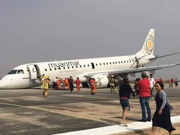 Gặp sự cố, máy bay Myanmar hạ cánh bằng mũi ảnh 2