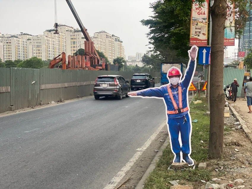 Một mô hình chỉ dẫn người tham gia giao thông di chuyển qua khu vực dự án.