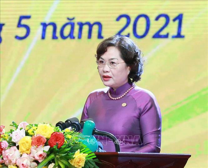 Đồng chí Nguyễn Thị Hồng, Ủy viên Trung ương Đảng, Thống đốc Ngân hàng Nhà nước Việt Nam đọc diễn văn Lễ kỷ niệm. Ảnh: Phương Hoa/TTXVN