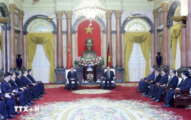 Chủ tịch nước Tô Lâm tiếp Chủ tịch Chính hiệp Trung Quốc Vương Hộ Ninh. (Ảnh: Nhan Sáng/TTXVN)