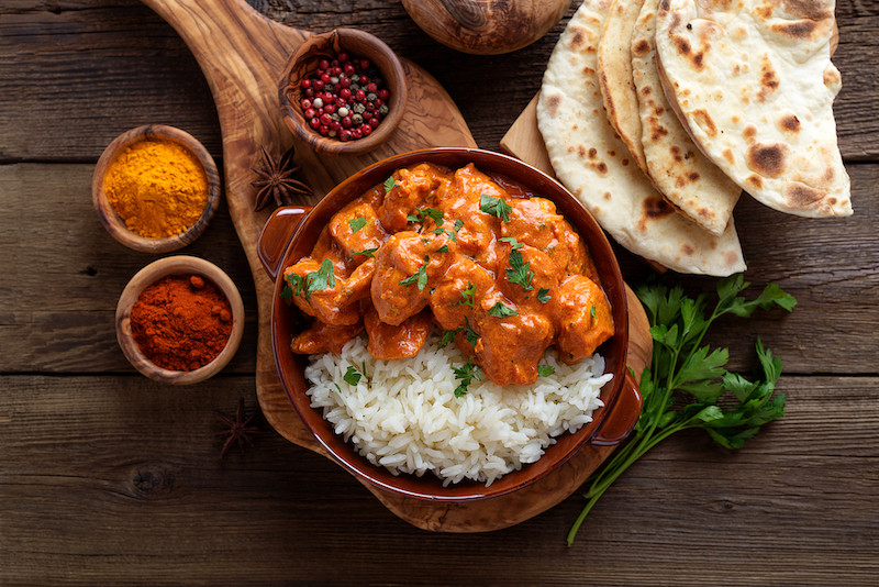 Món Tikka Masala thường được ăn kèm với cơm và bánh mì naan đặc sản của Ấn Độ. Ảnh: St. Món Tikka Masala thường được ăn kèm với cơm và bánh mì naan đặc sản của Ấn Độ. Ảnh: St.