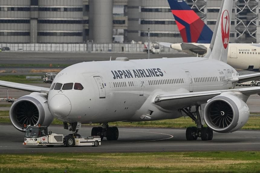 Một chiếc máy bay của Hãng hàng không Japan Airlines (JAL) - Ảnh: STRAITS TIMES. Một chiếc máy bay của Hãng hàng không Japan Airlines (JAL) - Ảnh: STRAITS TIMES.