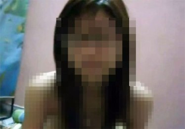 Nữ sinh bị tung clip sex “Em chỉ là nạn nhân” (Ảnh chụp từ clip)