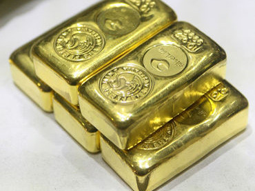 Vàng đang tiến gần mức 1.700USD/Oz. . Ảnh: Nguồn ảnh:Bloomberg Vàng đang tiến gần mức 1.700USD/Oz.