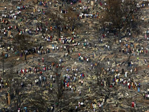 Bình gas phát nổ liên tiếp, 1.000 ngôi nhà chìm trong biển lửa ảnh 6