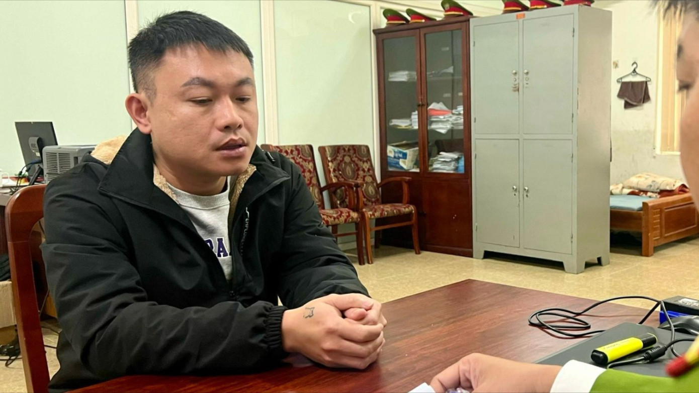 Đối tượng Nguyễn Sĩ Toàn tại cơ quan công an. Ảnh: CACC