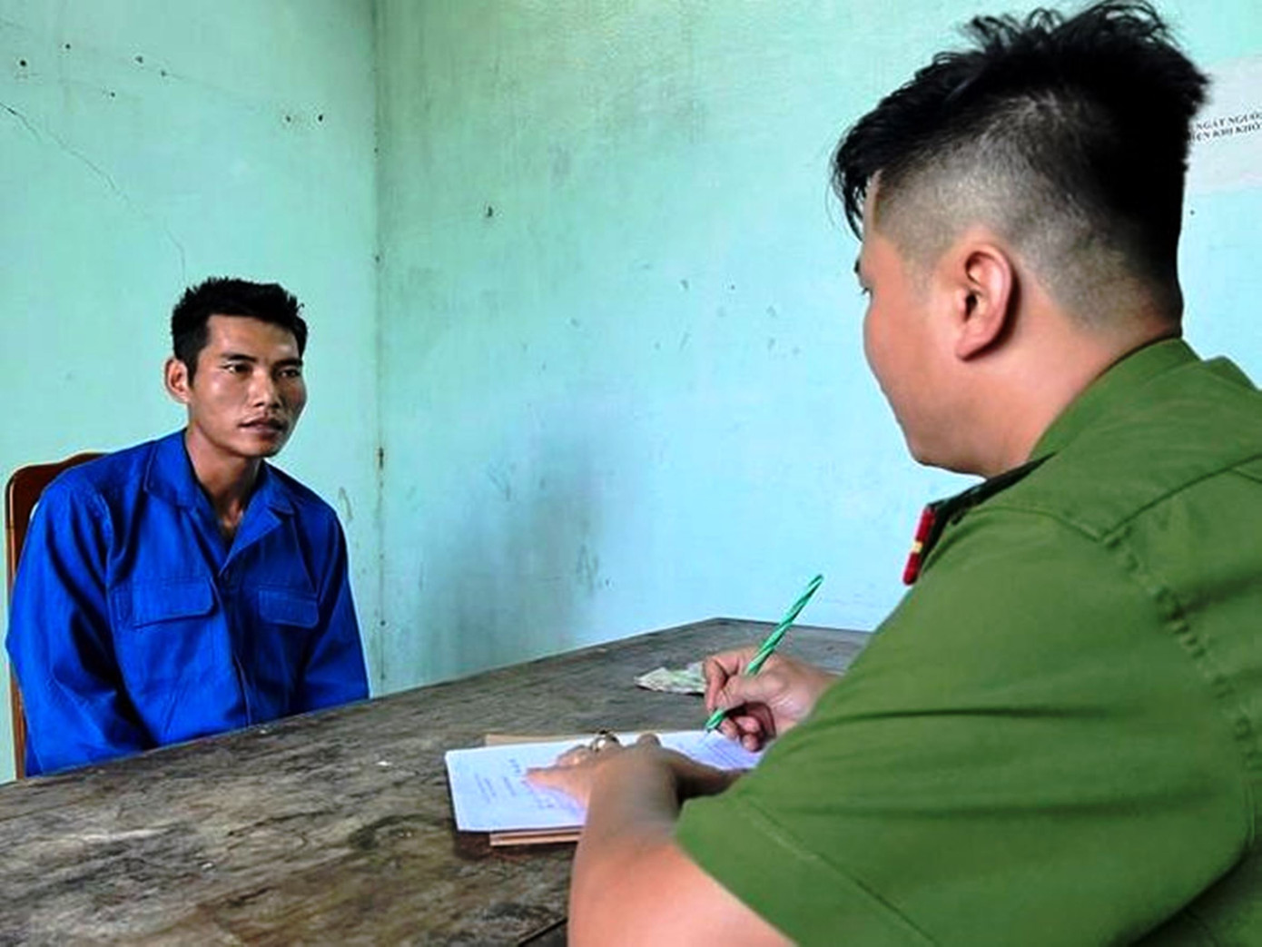 Đối tượng Hồ Hải Quan tại cơ quan công an. Đối tượng Hồ Hải Quan tại cơ quan công an.