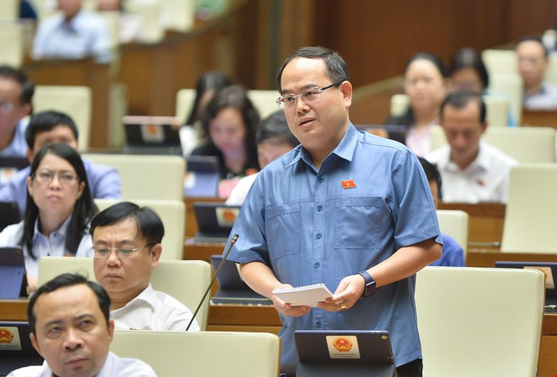 Ông Quản Minh Cường phát biểu tại kỳ họp Quốc hội. Ông Quản Minh Cường phát biểu tại kỳ họp Quốc hội.