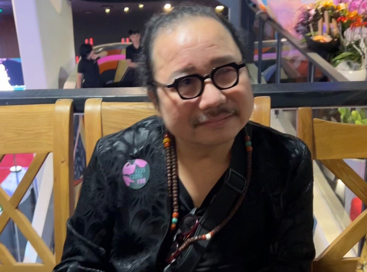 Nhạc sĩ Trần Mạnh Tuấn tại sự kiện âm nhạc.