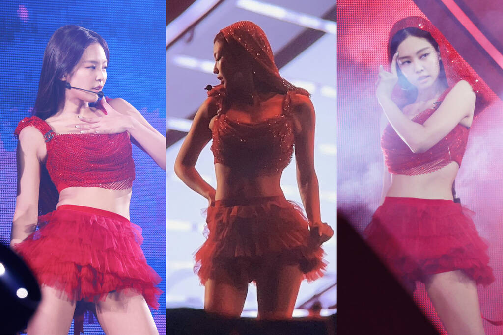 Jennie theo trend khăn trùm đầu trong màn diễn solo tối 16/9. Trang phục crop top ánh kim giúp nữ rapper tôn lên vẻ gợi cảm.