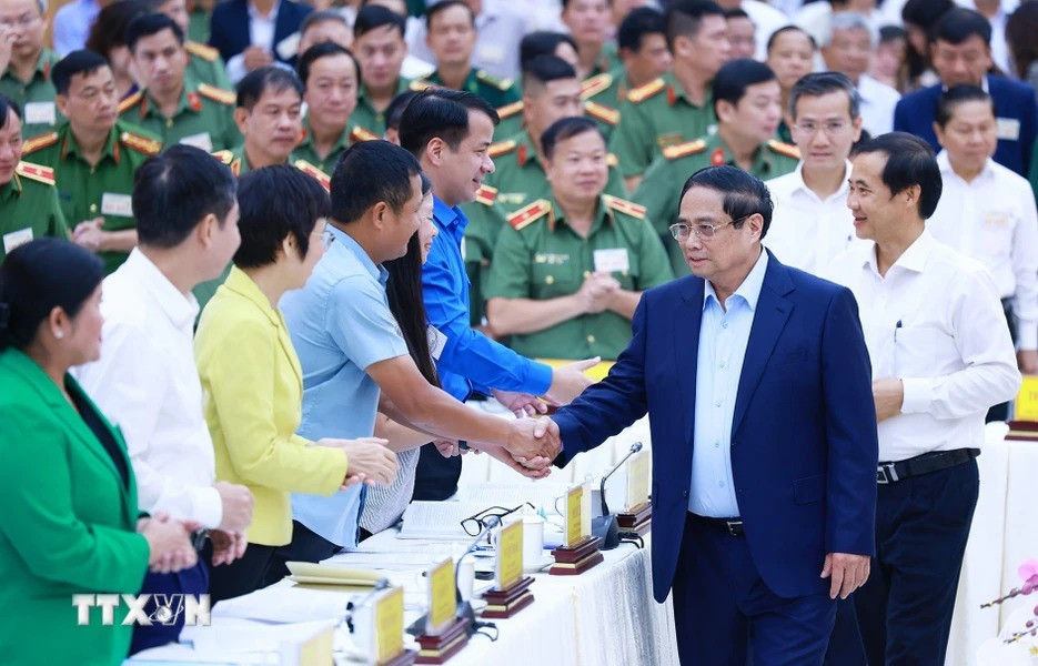 Thủ tướng Phạm Minh Chính với các đại biểu dự Hội nghị đảm bảo an ninh trật tự phục vụ phát triển kinh tế-xã hội các tỉnh Tây Nguyên. Ảnh: Dương Giang/TTXVN.