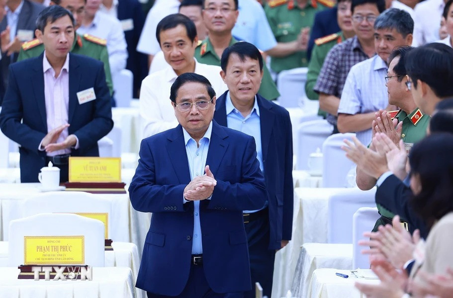 Thủ tướng Phạm Minh Chính với các đại biểu dự Hội nghị đảm bảo an ninh trật tự phục vụ phát triển kinh tế-xã hội các tỉnh Tây Nguyên. Ảnh: Dương Giang/TTXVN.