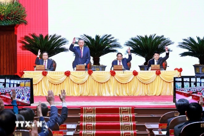 Hội nghị biểu quyết thông qua chương trình làm việc. (Ảnh: Dương Giang/TTXVN).