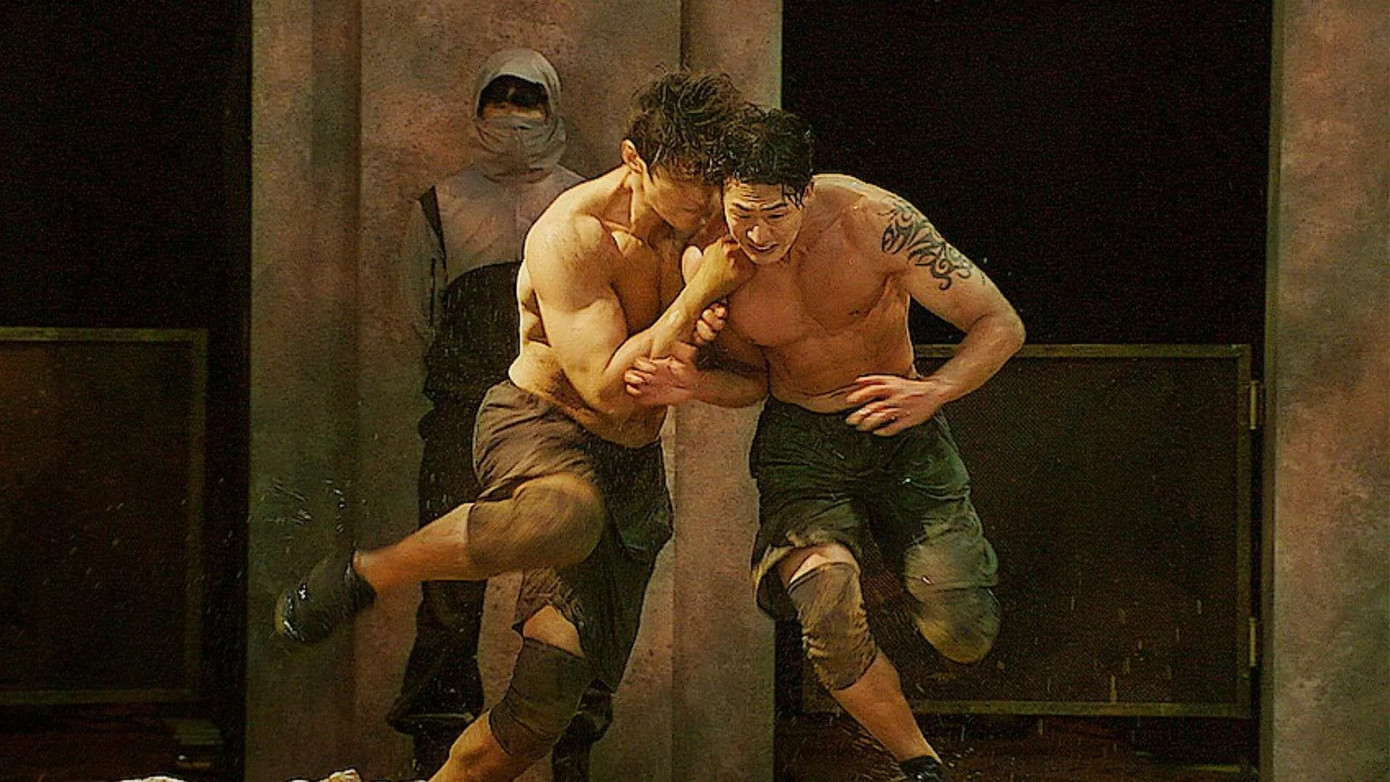 Physical: 100 hiện là chương trình sinh tồn gây chú ý của Hàn Quốc. Game show là sự cạnh tranh của 100 người đến từ các ngành nghề khác nhau, giành giải thưởng 300 triệu won (gần 6 tỷ đồng). Chương trình được coi là Squid Game đời thực và gây tranh cãi trên các diễn đàn do tính bạo lực.