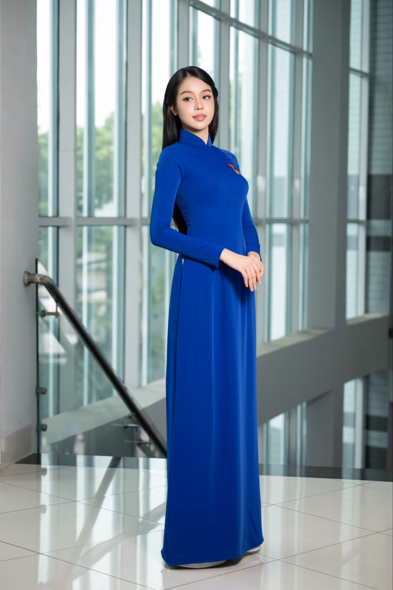 Hoa hậu Thanh Thủy diện áo dài truyền thống trong lễ tuyên dương.
