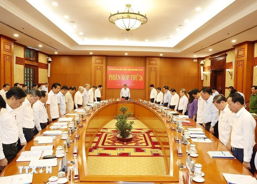 Tổng Bí thư, Chủ tịch nước Tô Lâm cùng các đại biểu dành một phút mặc niệm Tổng Bí thư Nguyễn Phú Trọng. (Ảnh: Trí Dũng/TTXVN)