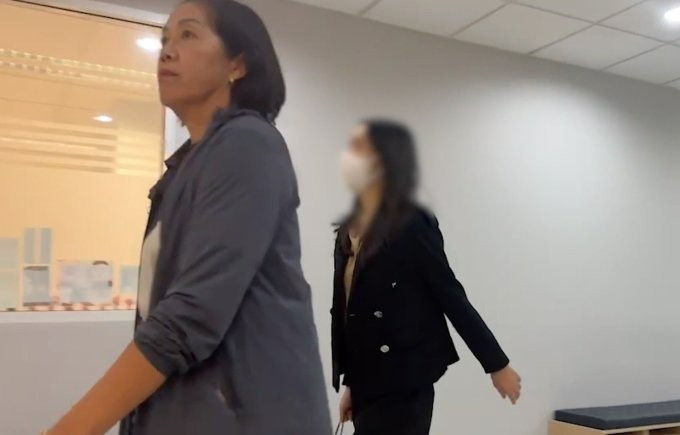 Min Pechaya né tránh truyền thông tại buổi thẩm vấn với cơ quan điều tra tối 16/10.