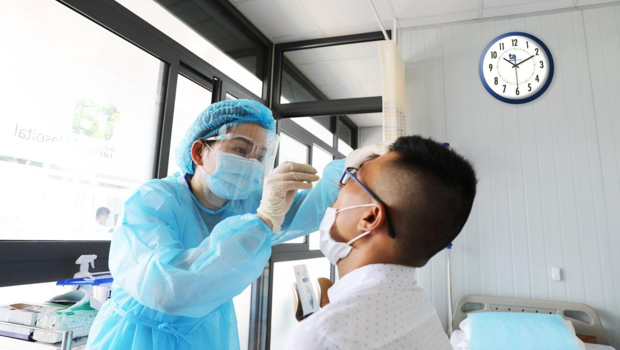 Người dân lấy mẫu xét nghiệm COVID-19 tại BVĐK Tâm Anh Người dân lấy mẫu xét nghiệm COVID-19 tại BVĐK Tâm Anh